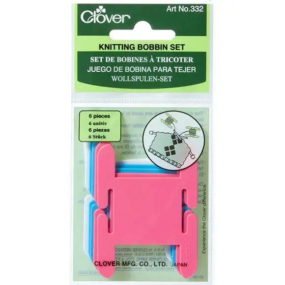 Clover knitting bobbin set packaging with pink and blue bobbins on a white background
