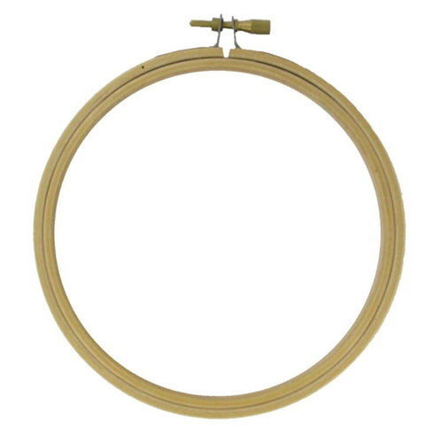 Wooden embroidery hoop on a white background
