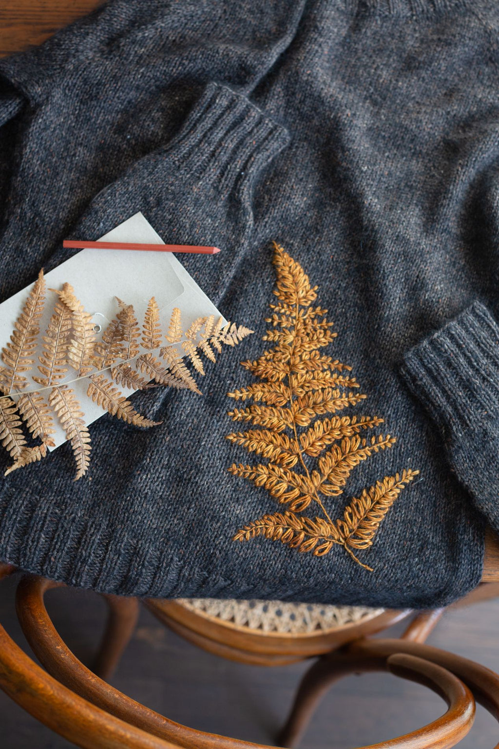 Embroidery on knits - gold fern embroidery