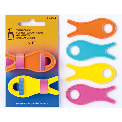 Colorful yarn bobbins with packaging on a white background